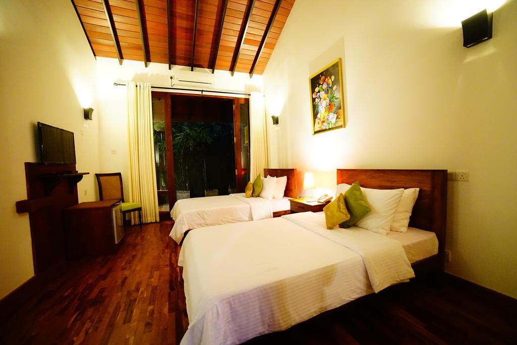 Lespri Grand Hotel Negombo Phòng bức ảnh
